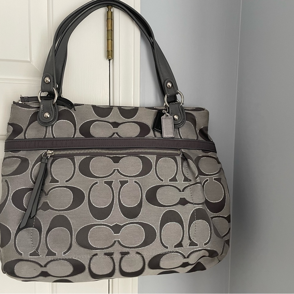 Coach Purse in gray/black signature logo pattern.